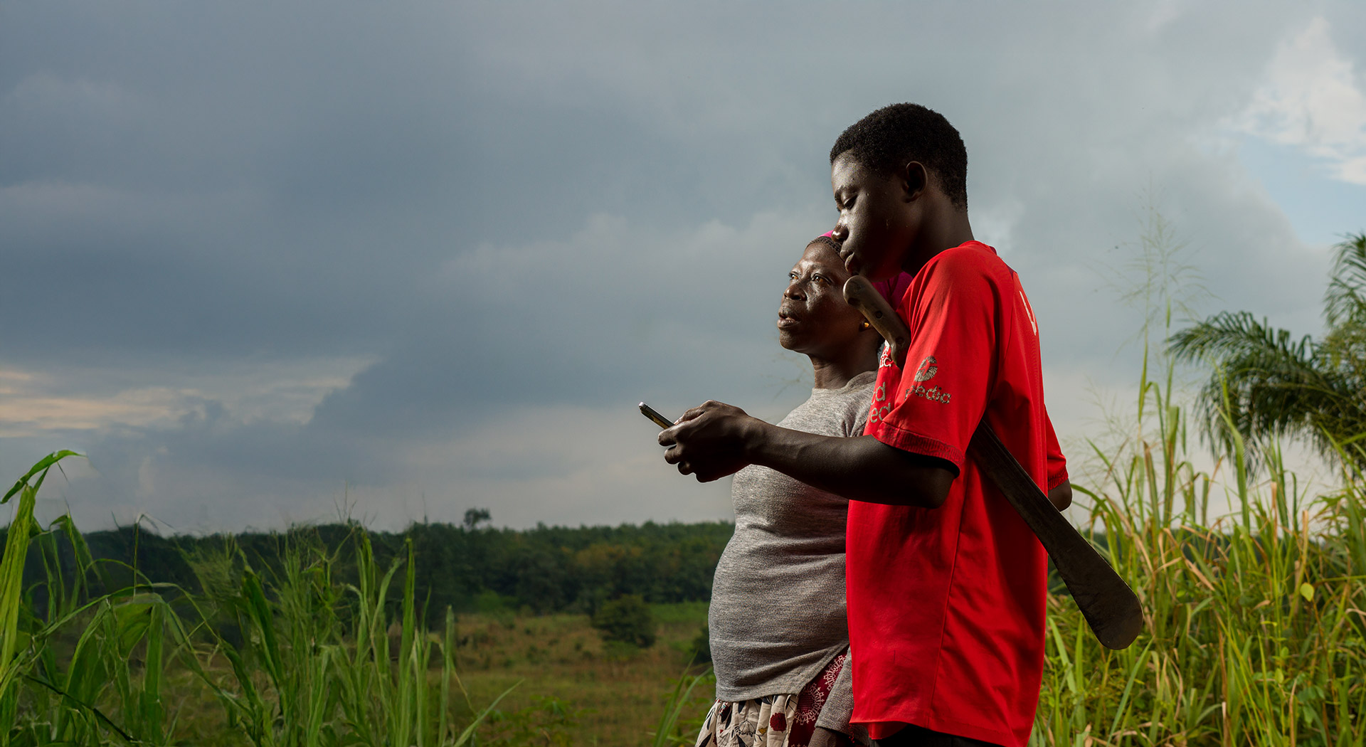 Clients using a phone in a field